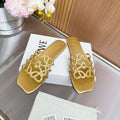 LOEWE 26S PETAL ANAGRAM SLIDE IN GOLD SOFT CALFSKIN