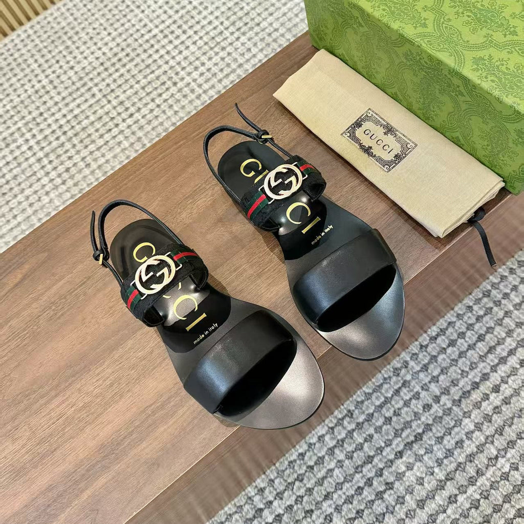 GUCCI 26S STRAP FLAT SANDALS IN BLACK CALFSKIN GOLD HARDWARE