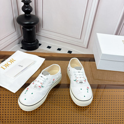 DIOR 26S LOW TOP SNEAKERS IN WHITE CANVAS WITH FLORAL EMBROIDERY