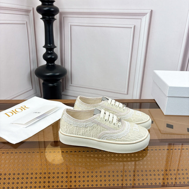 DIOR 26S LOW TOP SNEAKERS IN BEIGE CANVAS WITH WHITE LACE TRIM & LOGO PRINT