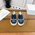 DIOR 26S LOW TOP SNEAKERS IN NAVY BLUE CANVAS WITH WHITE LACE TRIM & LOGO PRINT