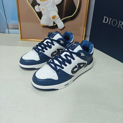 DIOR 26S LOW-TOP SNEAKER IN WHITE AND NAVY BLUE CALFSKIN