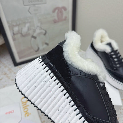 CHLOÉ 26S WEDGE SOLE SNEAKERS IN BLACK CALFSKIN