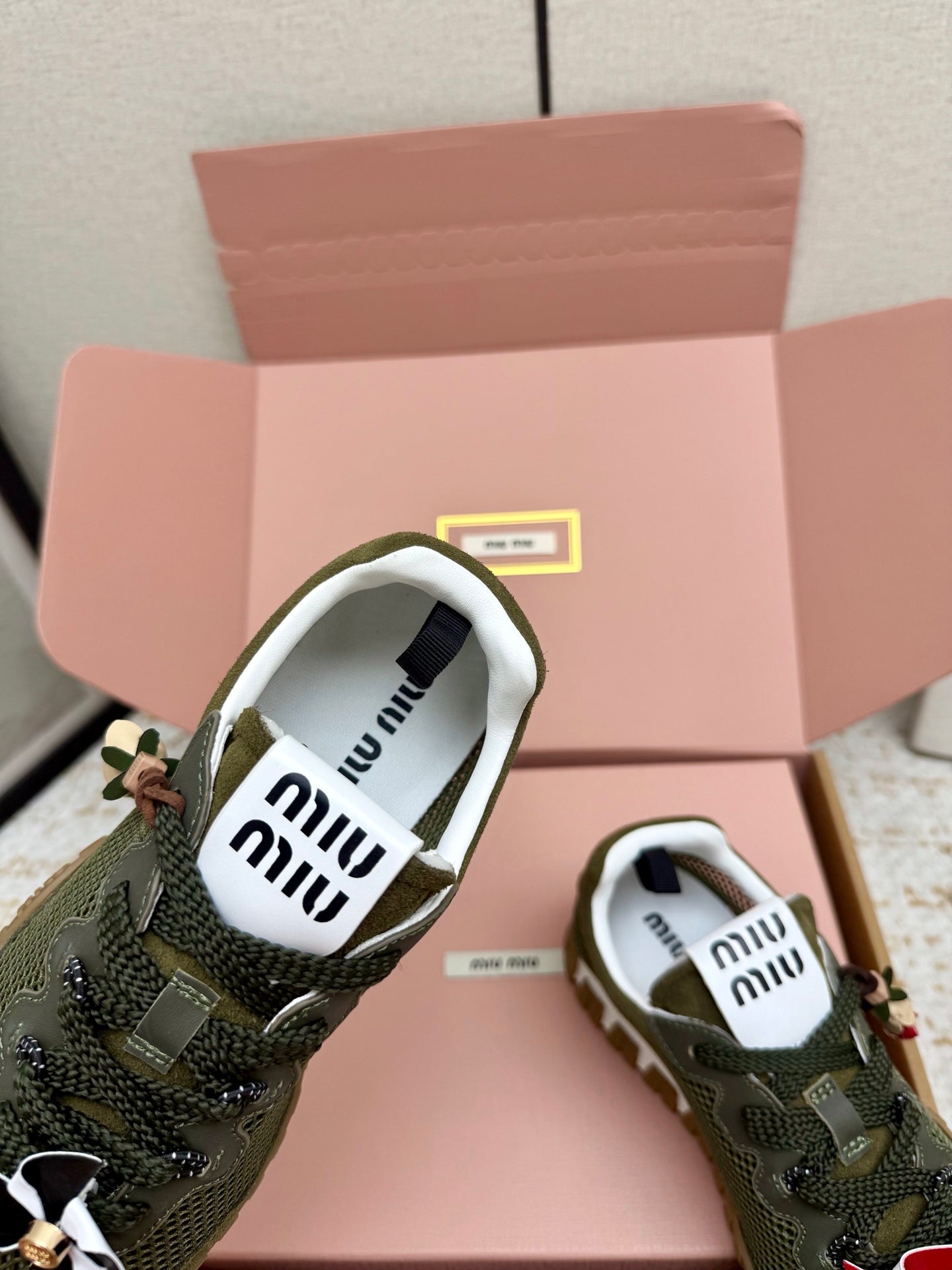 MIUMIU 26S CHARM SNEAKERS IN OLIVE GREEN MESH AND SUEDE