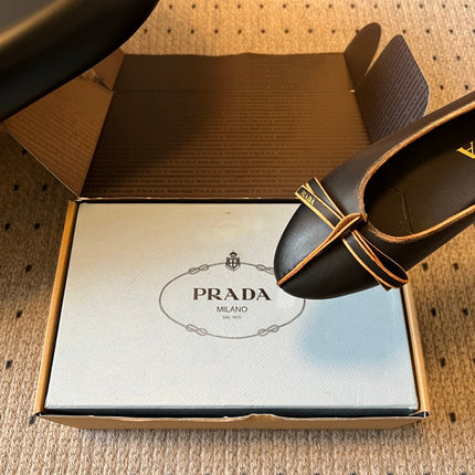 PRADA 26S POINTED TOE BOW FLATS IN BLACK CALFSKIN