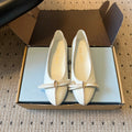PRADA 26S POINTED TOE BOW FLATS IN IVORY WHITE CALFSKIN