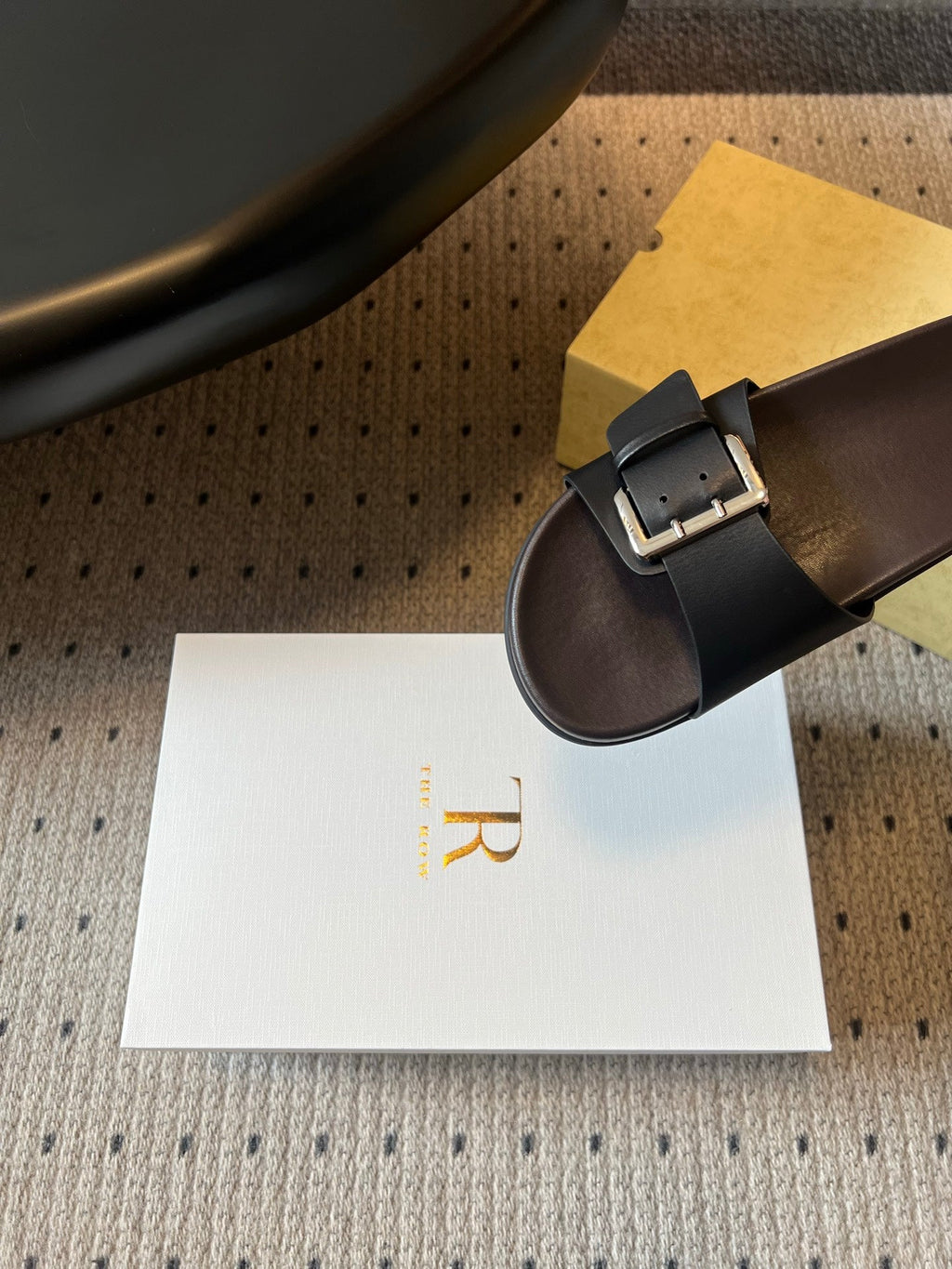 THE ROW 26S BUCKLE SLIDE SANDALS IN BLACK CALFSKIN