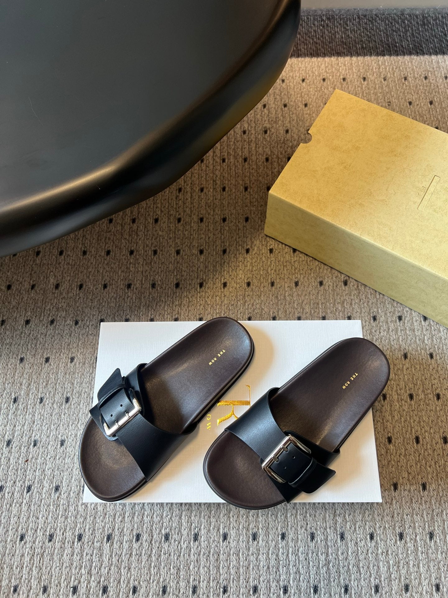 THE ROW 26S BUCKLE SLIDE SANDALS IN BLACK CALFSKIN