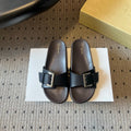 THE ROW 26S BUCKLE SLIDE SANDALS IN BLACK CALFSKIN