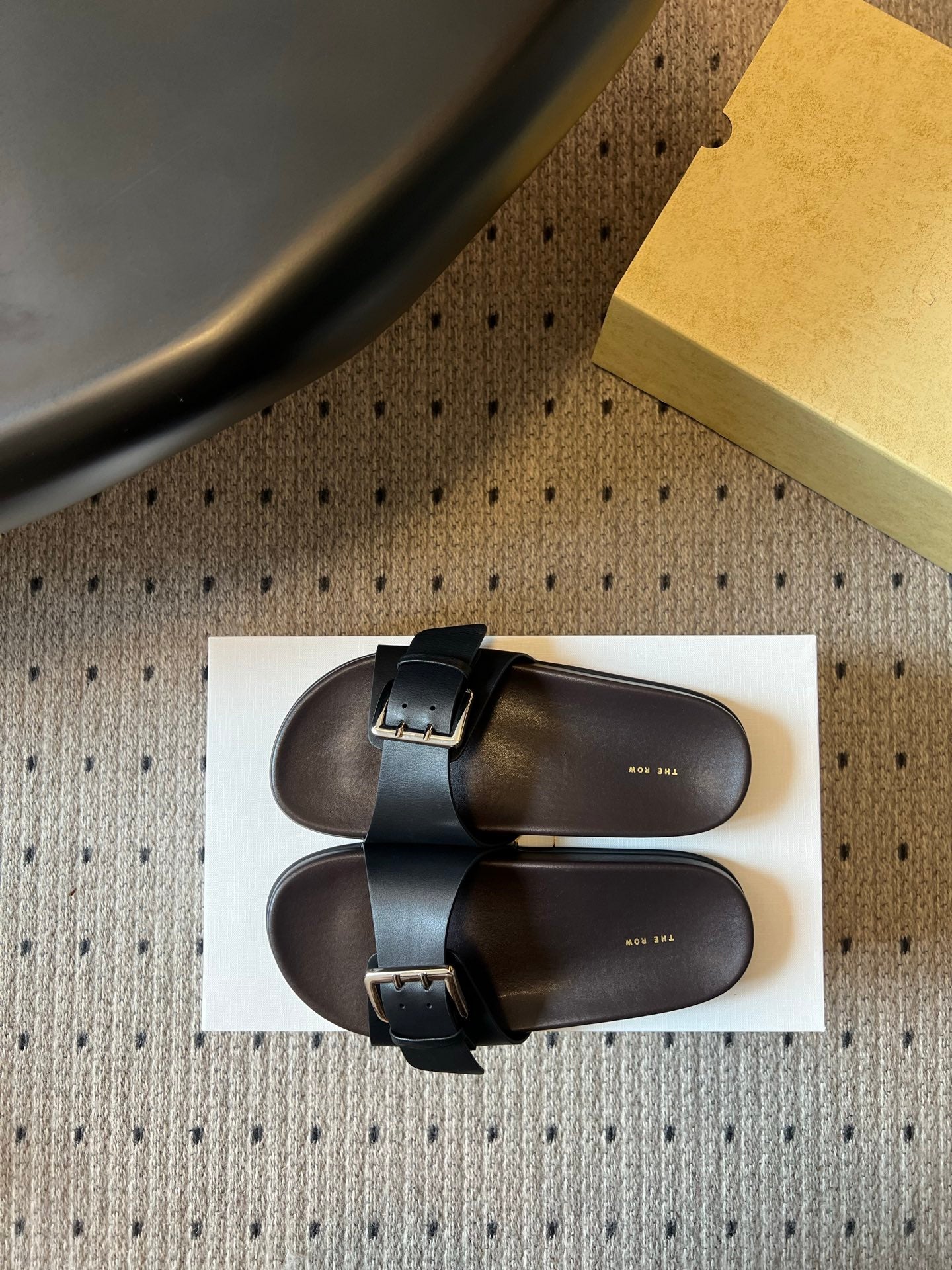 THE ROW 26S BUCKLE SLIDE SANDALS IN BLACK CALFSKIN