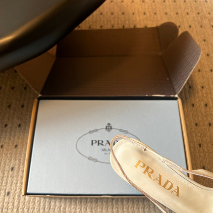 PRADA 26S POINTED TOE FRINGE BOW SLINGBACK PUMPS 85MM IN IVORY WHITE CALFSKIN