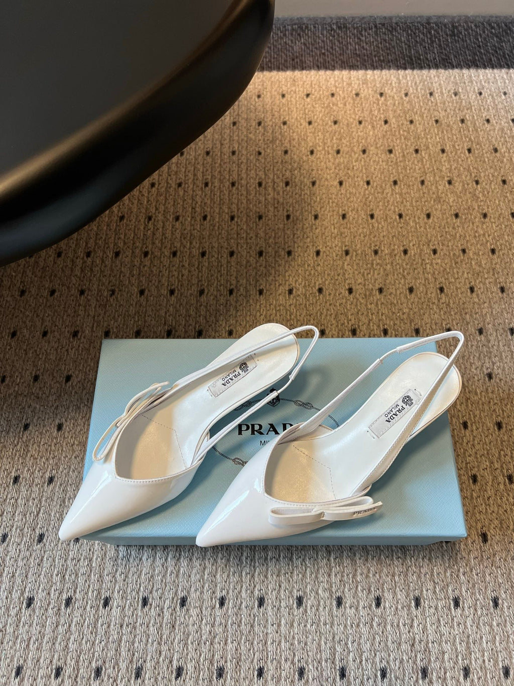 PRADA 26S BOW DETAIL SLINGBACK PUMPS 55MM IN WHITE PATENT CALFSKIN