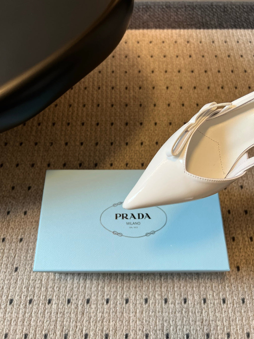 PRADA 26S BOW DETAIL SLINGBACK PUMPS 55MM IN WHITE PATENT CALFSKIN