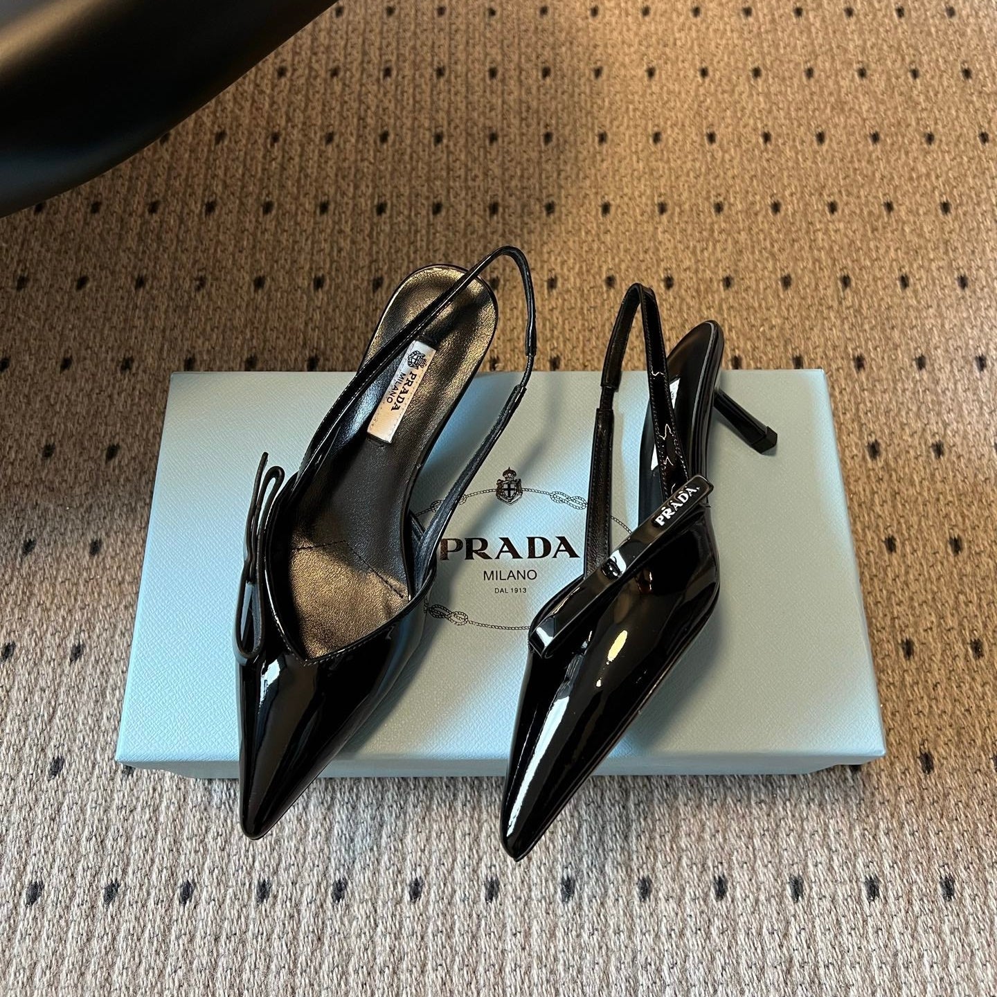 PRADA 26S BOW DETAIL SLINGBACK PUMPS 55MM IN BLACK PATENT CALFSKIN