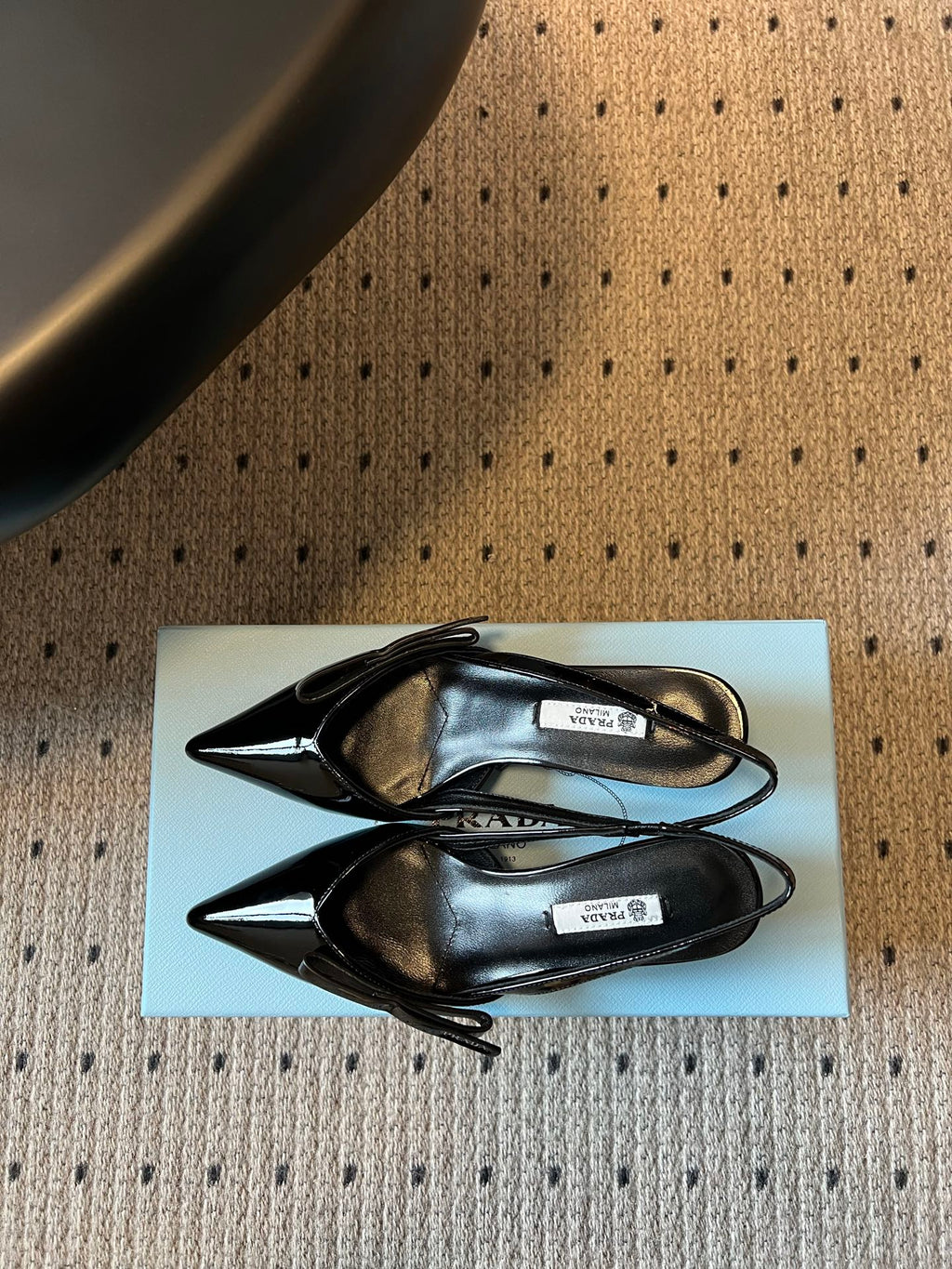 PRADA 26S BOW DETAIL SLINGBACK PUMPS 55MM IN BLACK PATENT CALFSKIN
