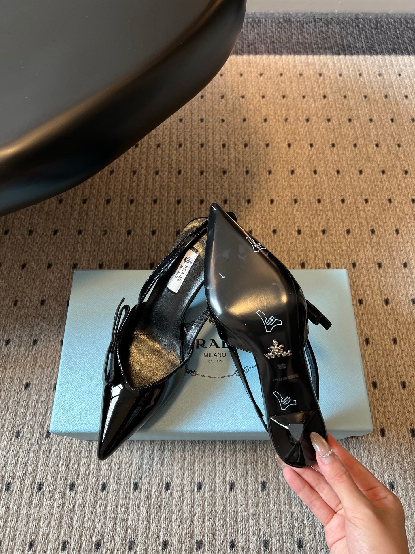 PRADA 26S BOW DETAIL SLINGBACK PUMPS 75MM IN BLACK PATENT CALFSKIN