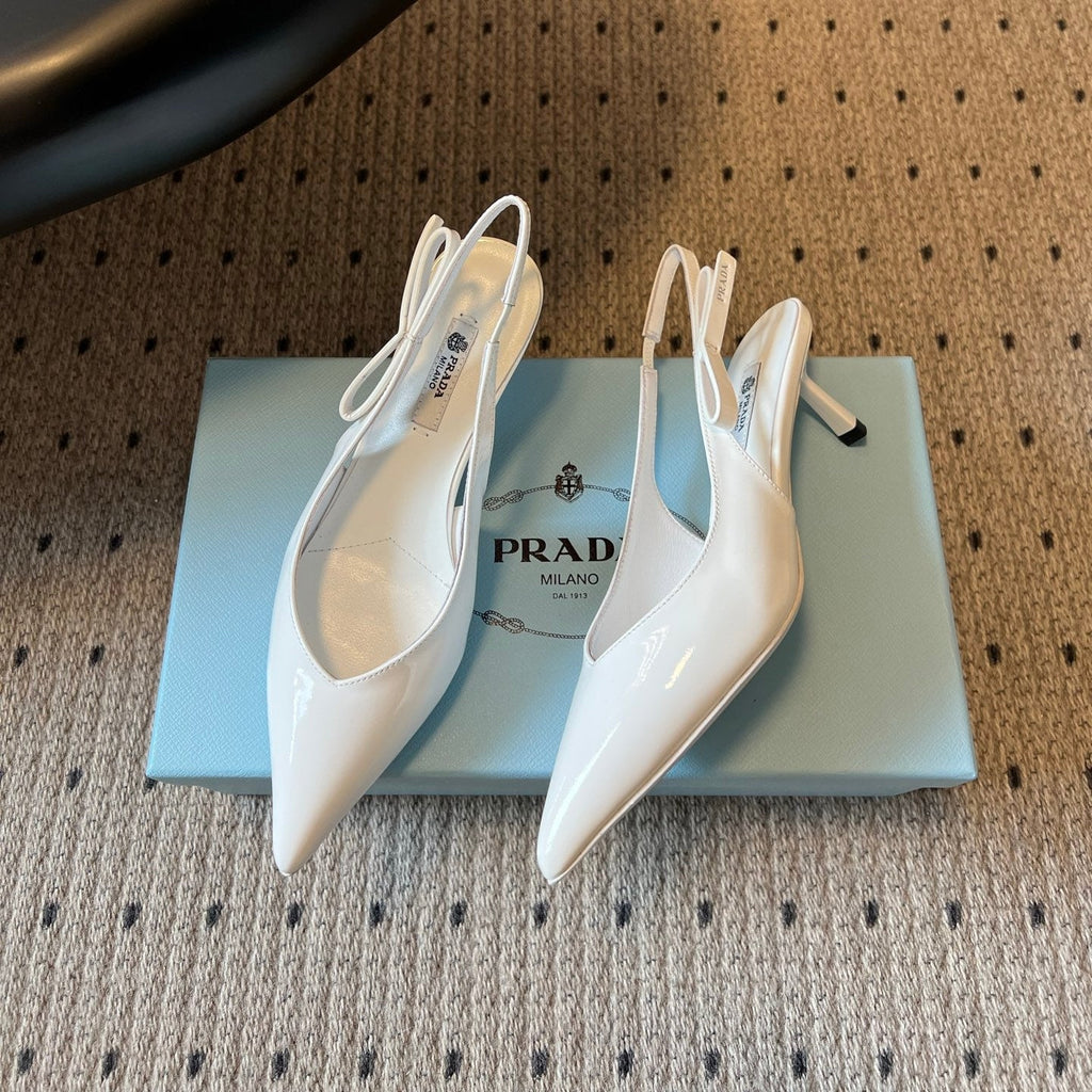PRADA 26S POINTED TOE SLINGBACK HEELS 55MM IN WHITE PATENT CALFSKIN