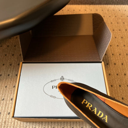 PRADA 26S POINTED TOE BOW FRINGE PUMPS 50MM IN BLACK CALFSKIN
