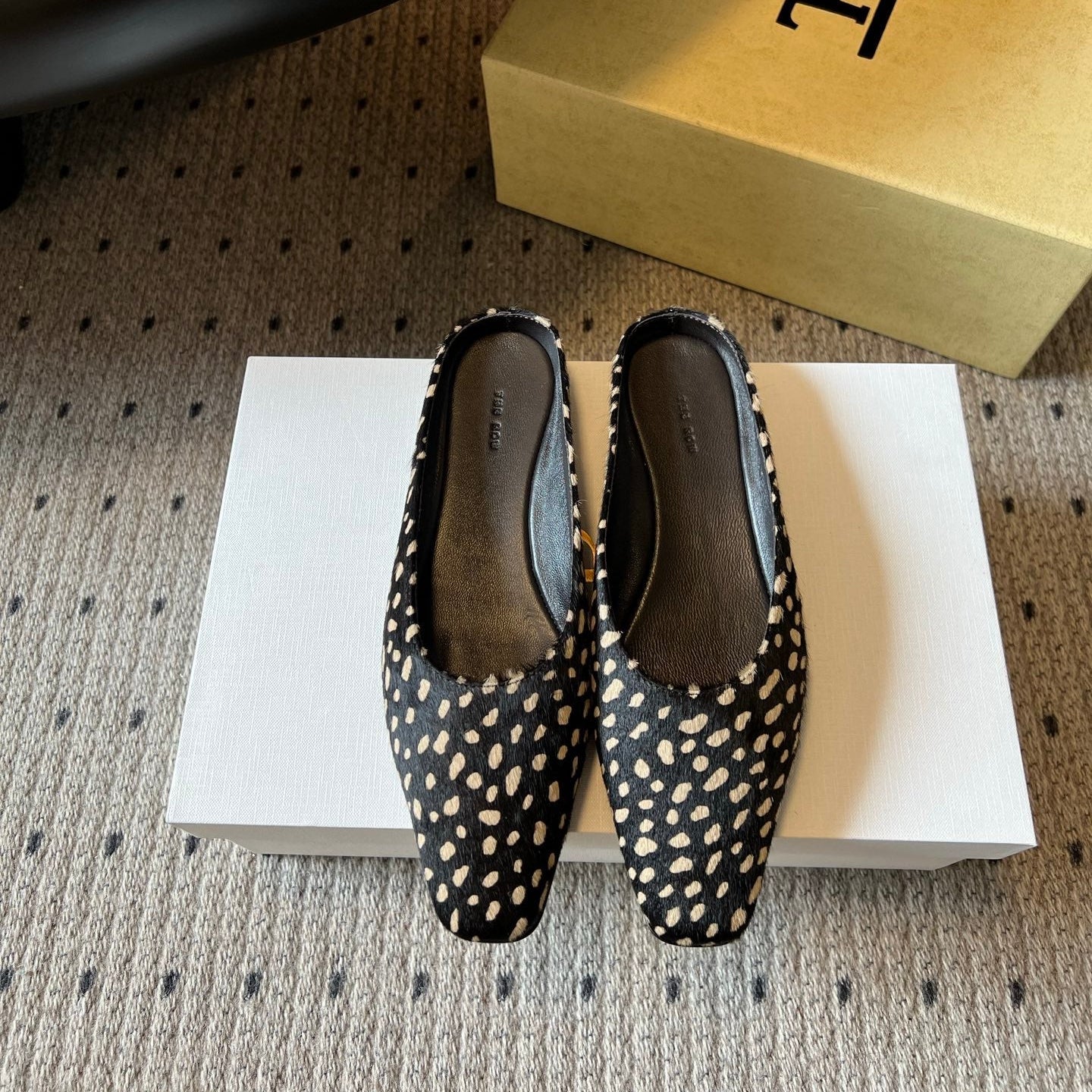 THE ROW 26S SQUARE TOE BACKLESS SLIDES IN BLACK SPOTTED CALF HAIR