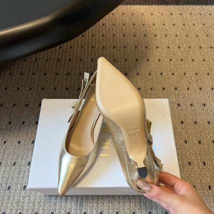 DIOR 26S POINTED-TOE PUMPS 65MM IN GOLD CALFSKIN WITH J'ADIOR BOW