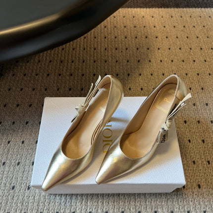 DIOR 26S POINTED-TOE PUMPS 95MM IN GOLD CALFSKIN WITH J'ADIOR BOW