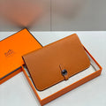 TOGO PASSPORT HOLDER 20 IN GINGER ORANGE CALFSKIN