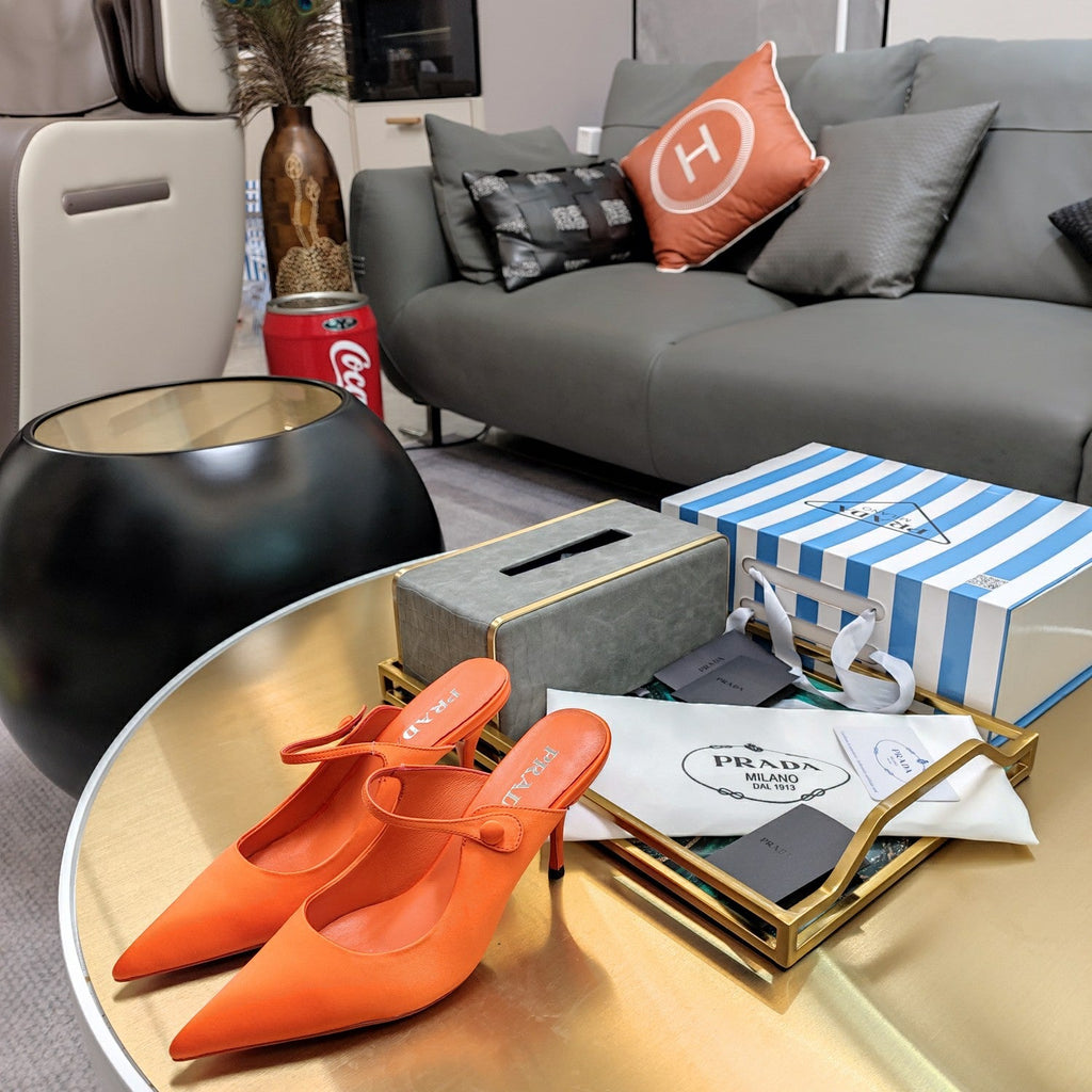 PRADA 26S HIGH-HEELED MULES 85MM IN ORANGE SATIN