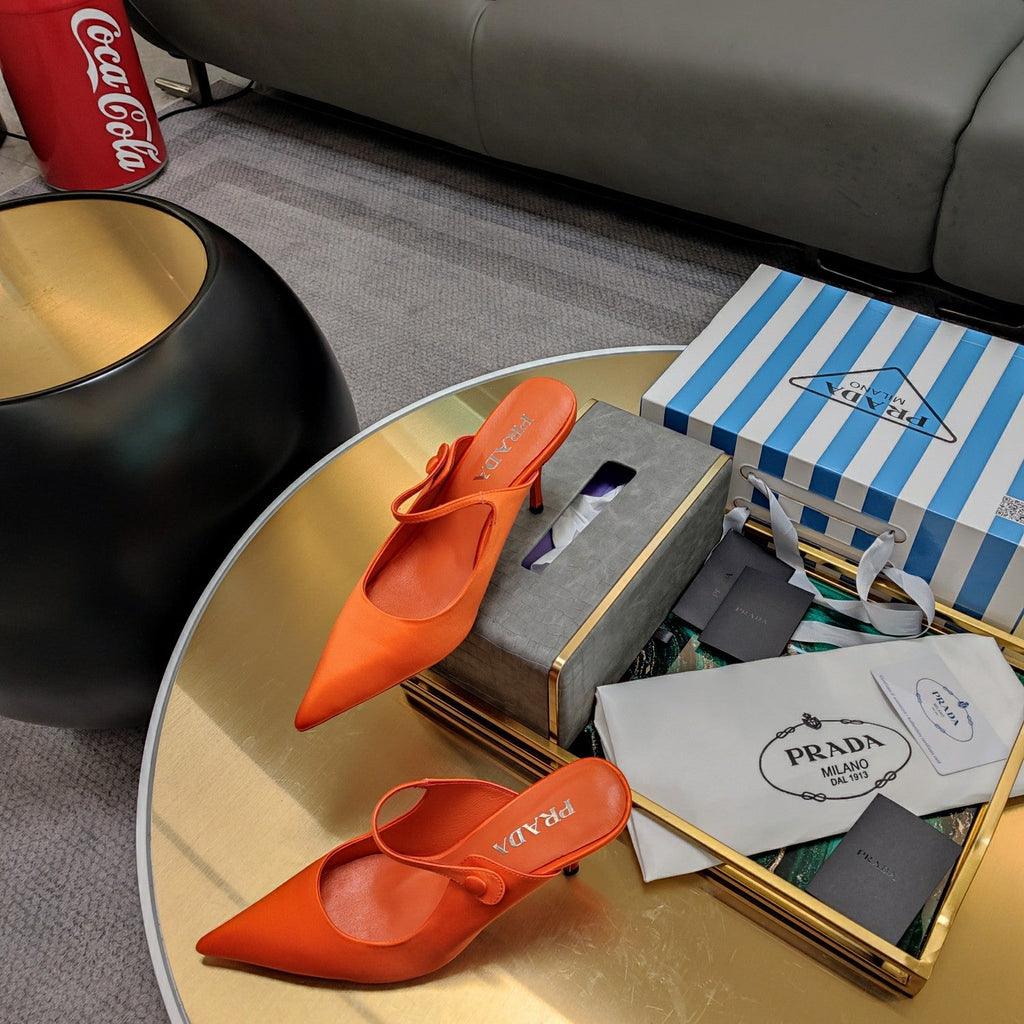 PRADA 26S HIGH-HEELED MULES 85MM IN ORANGE SATIN