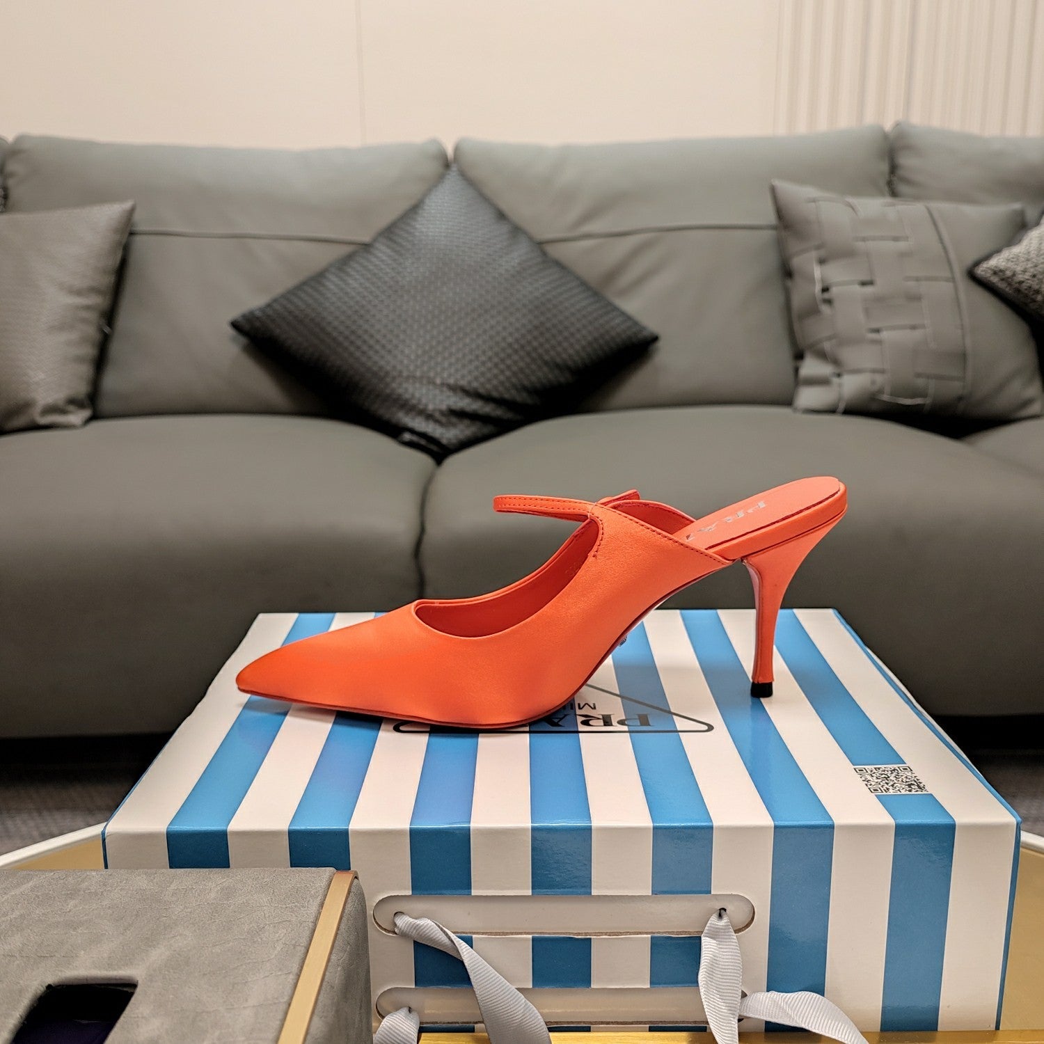 PRADA 26S HIGH-HEELED MULES 85MM IN ORANGE SATIN