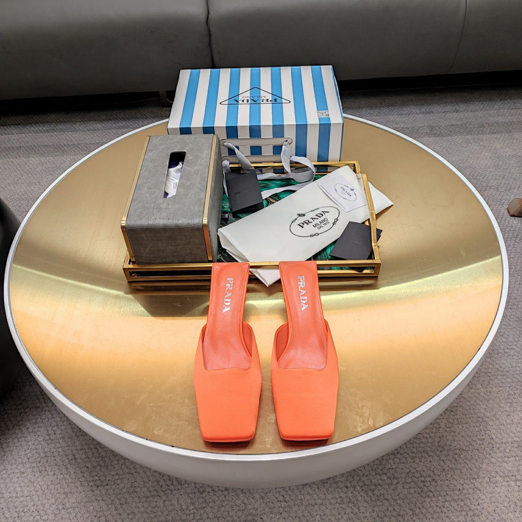 PRADA 26S SQUARE TOE MULES 40MM IN ORANGE SATIN
