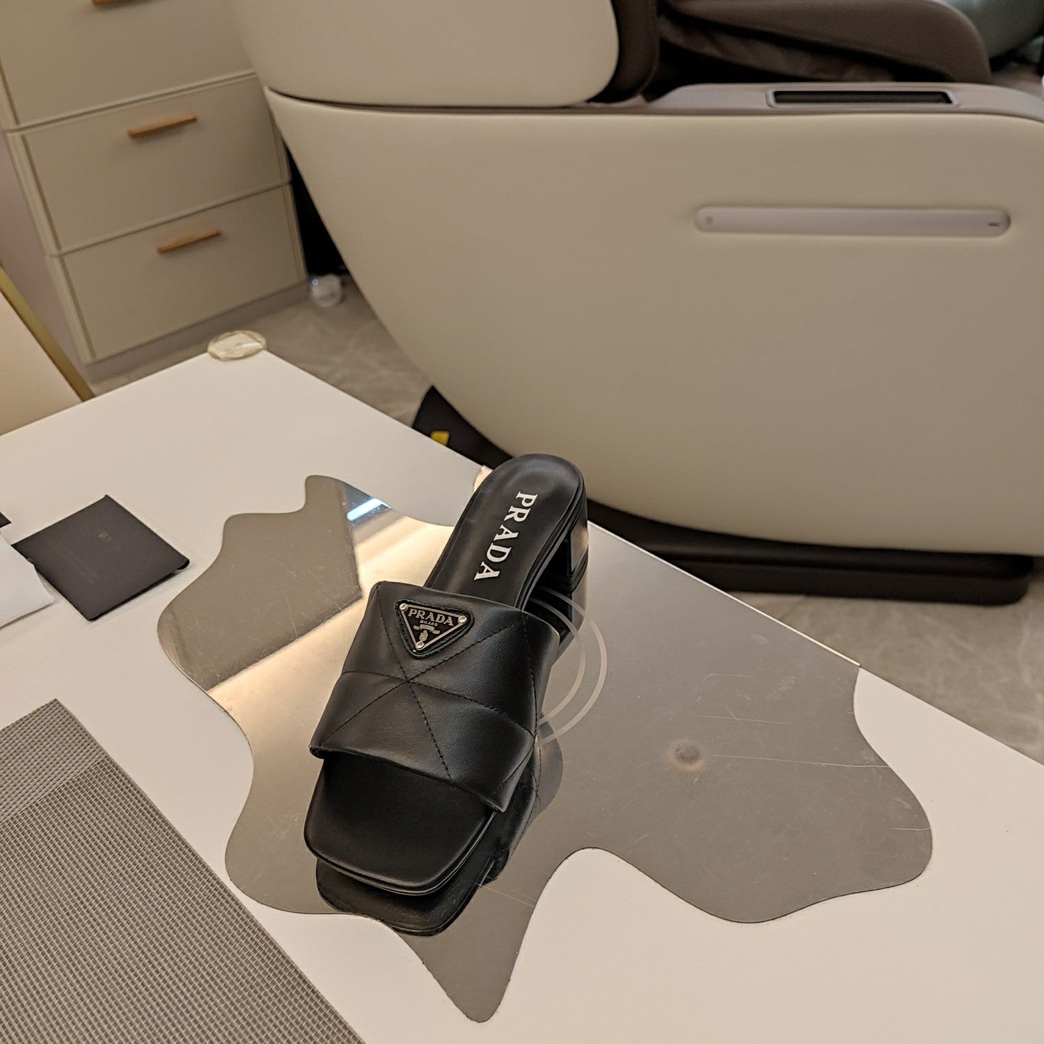 PRADA 26S LOW HEEL OPEN TOE MULES 45MM IN BLACK QUILTED CALFSKIN WITH LOGO