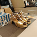 PRADA 26S HEELED SANDALS 65MM IN GOLD CALFSKIN