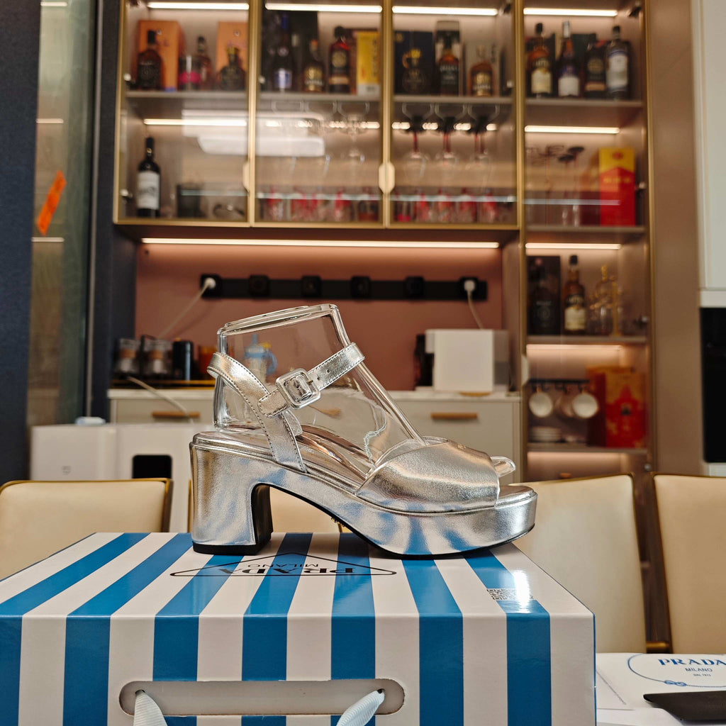 PRADA 26S HEELED SANDALS 65MM IN SILVER CALFSKIN