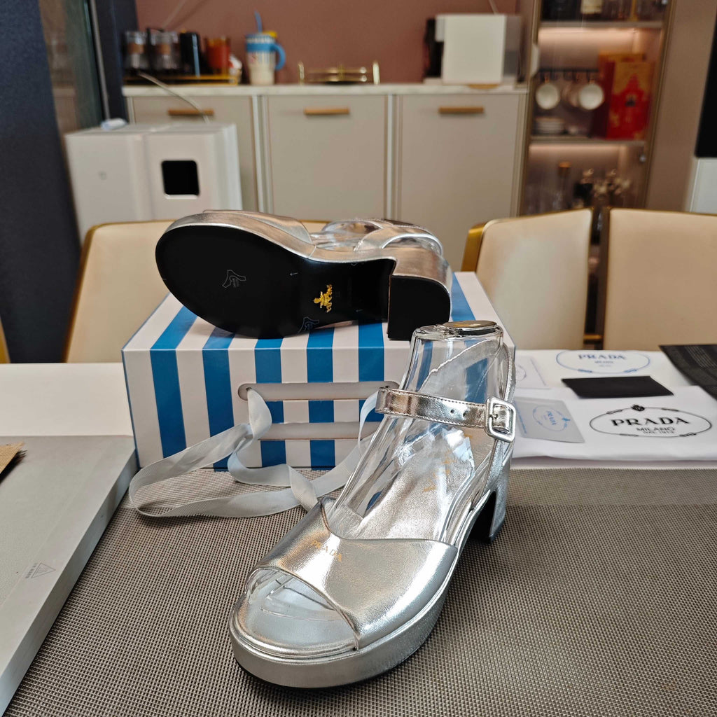 PRADA 26S HEELED SANDALS 65MM IN SILVER CALFSKIN