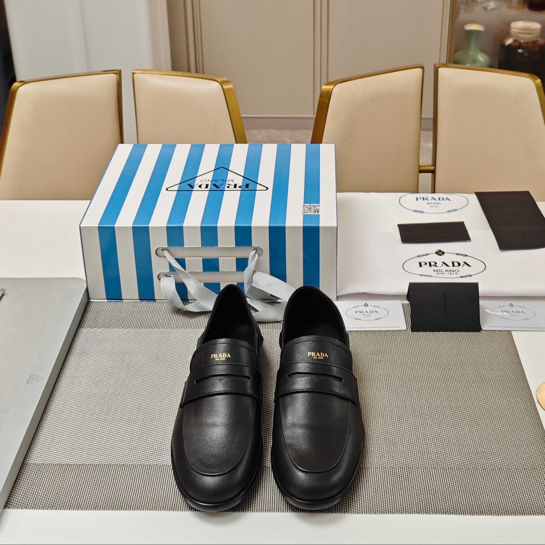 PRADA 26S LOAFERS 20MM IN BLACK CALFSKIN