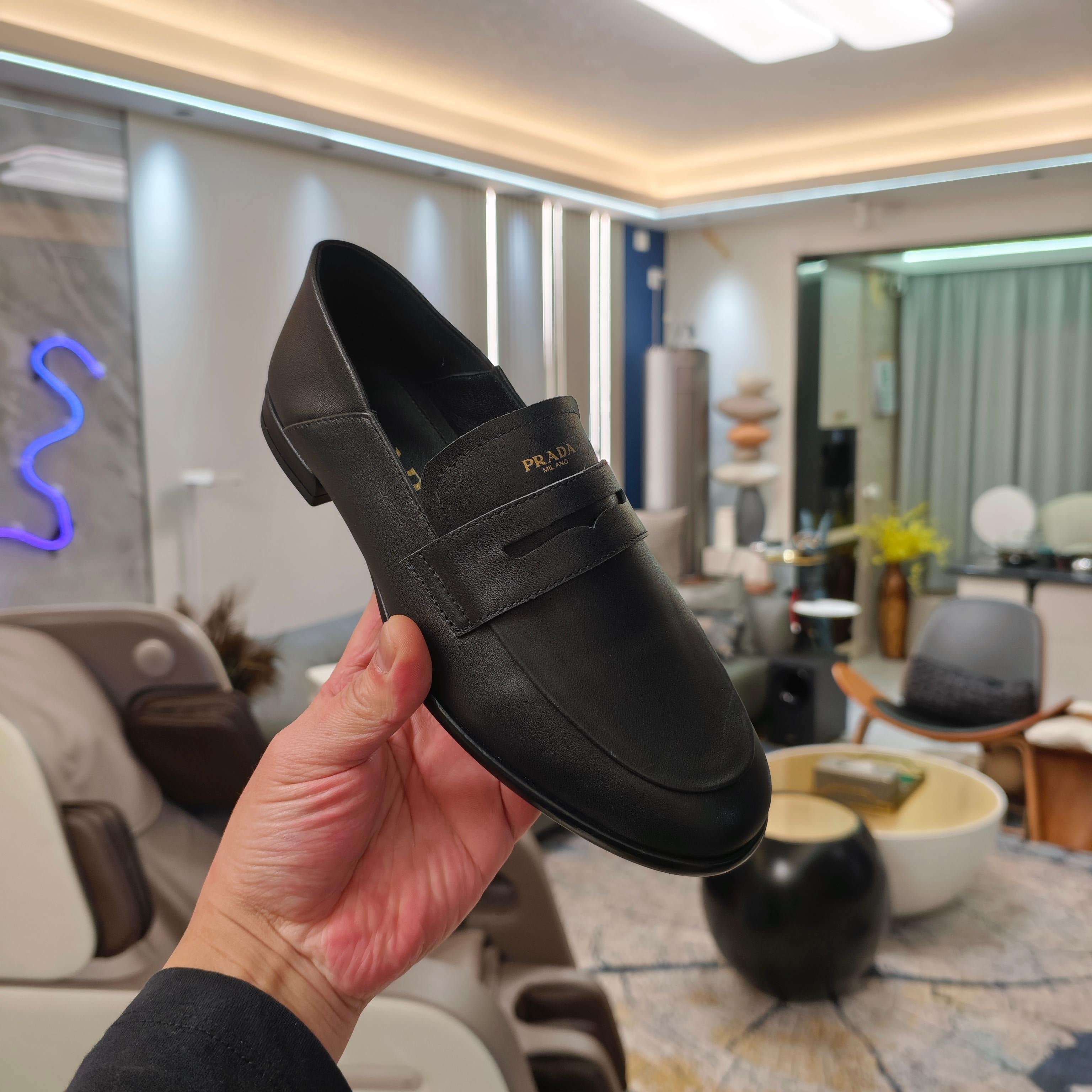 PRADA 26S LOAFERS 20MM IN BLACK CALFSKIN