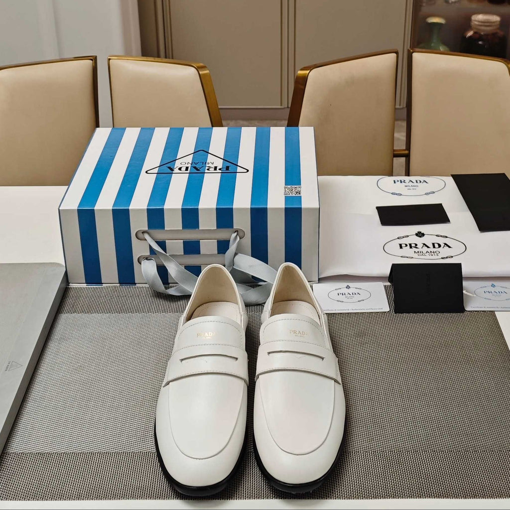 PRADA 26S LOAFERS 20MM IN CREAM WHITE CALFSKIN