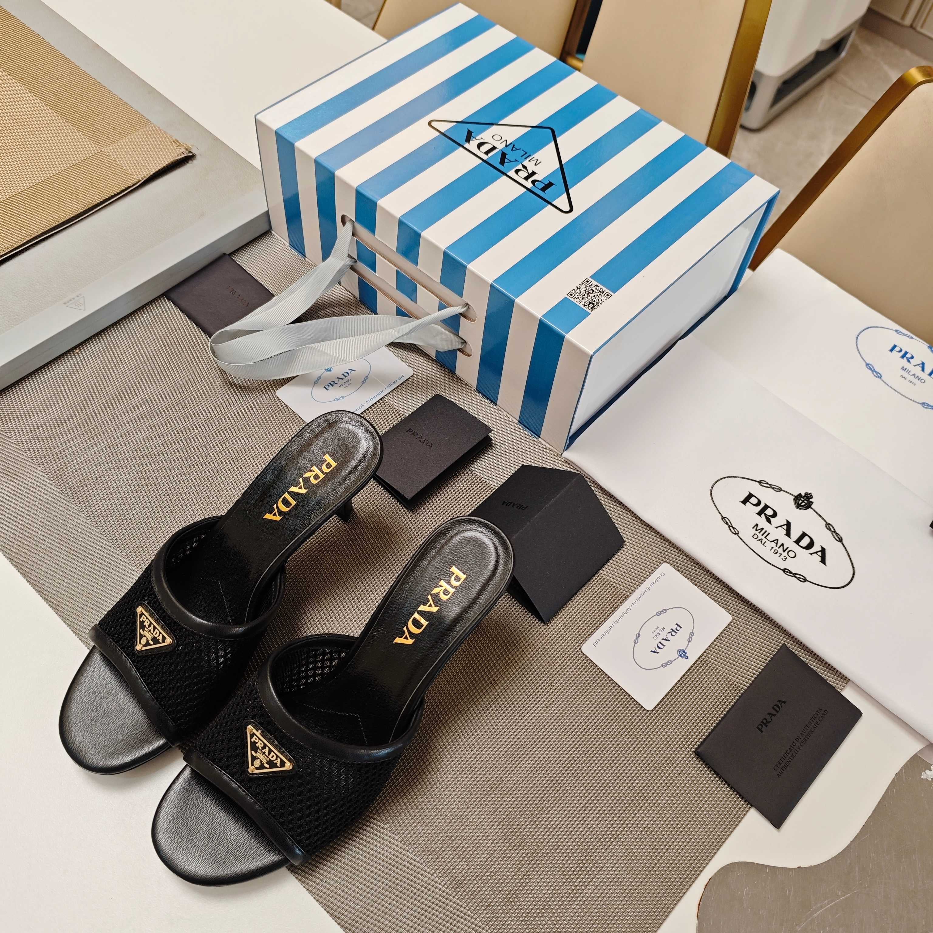PRADA 26S MULE SANDALS 75MM IN BLACK CALFSKIN AND MESH GOLD HARDWARE