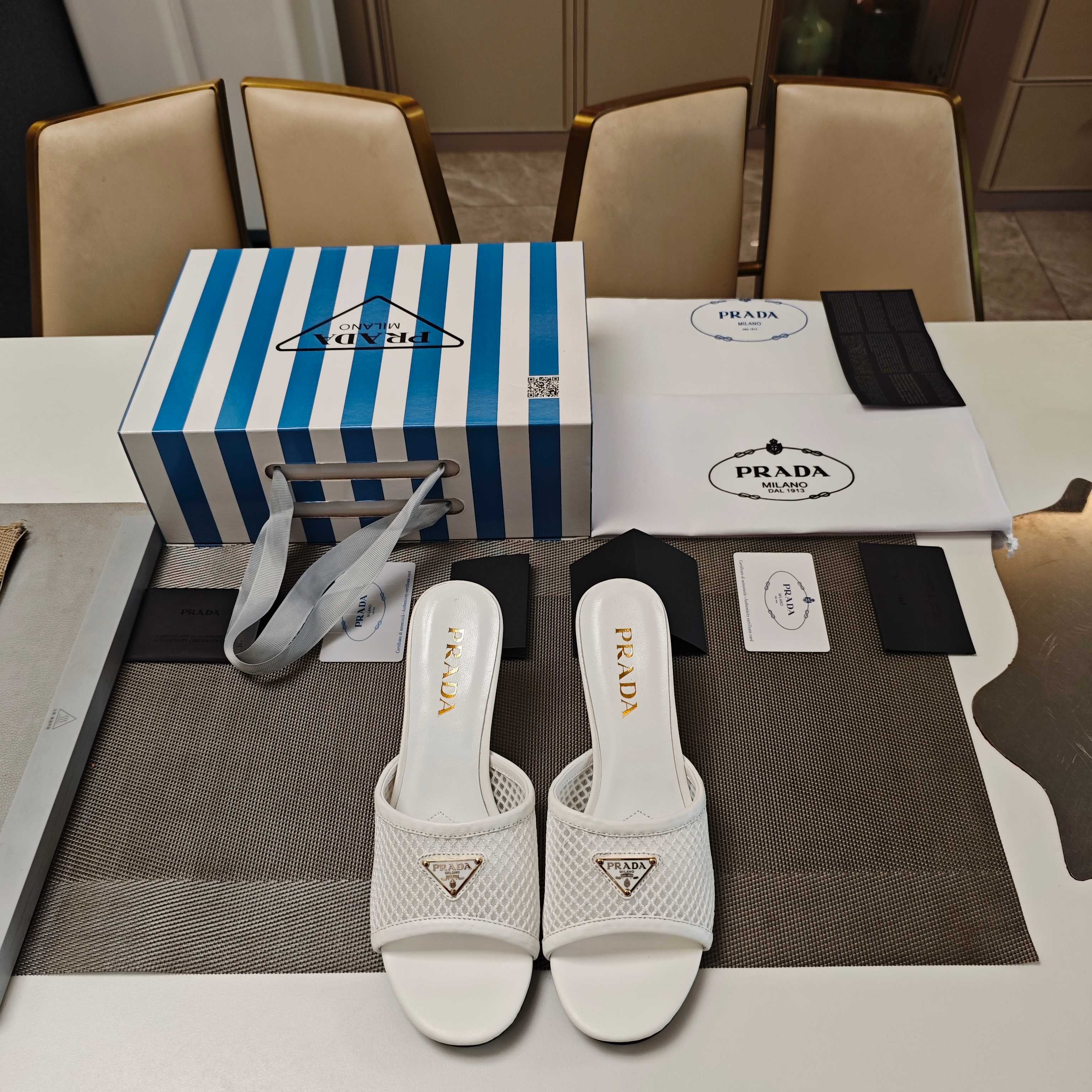 PRADA 26S MULE SANDALS 75MM IN WHITE CALFSKIN AND MESH GOLD HARDWARE