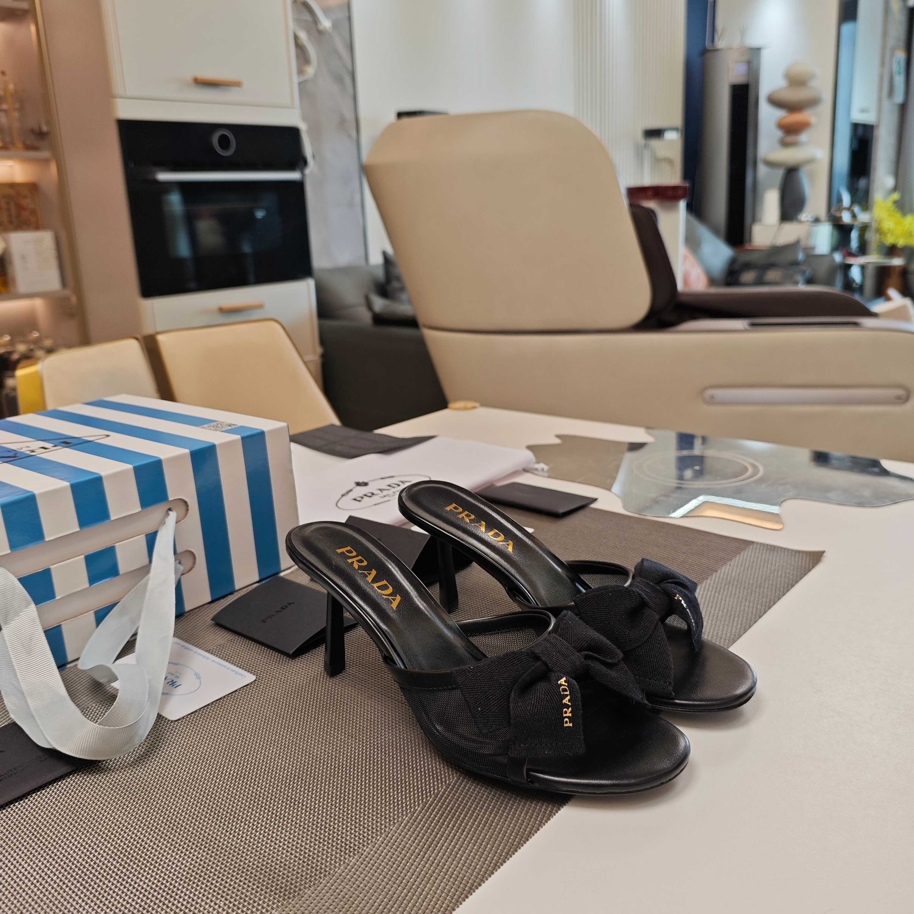 PRADA 26S HEEL MULE SANDALS 75MM IN BLACK CALFSKIN WITH BOW