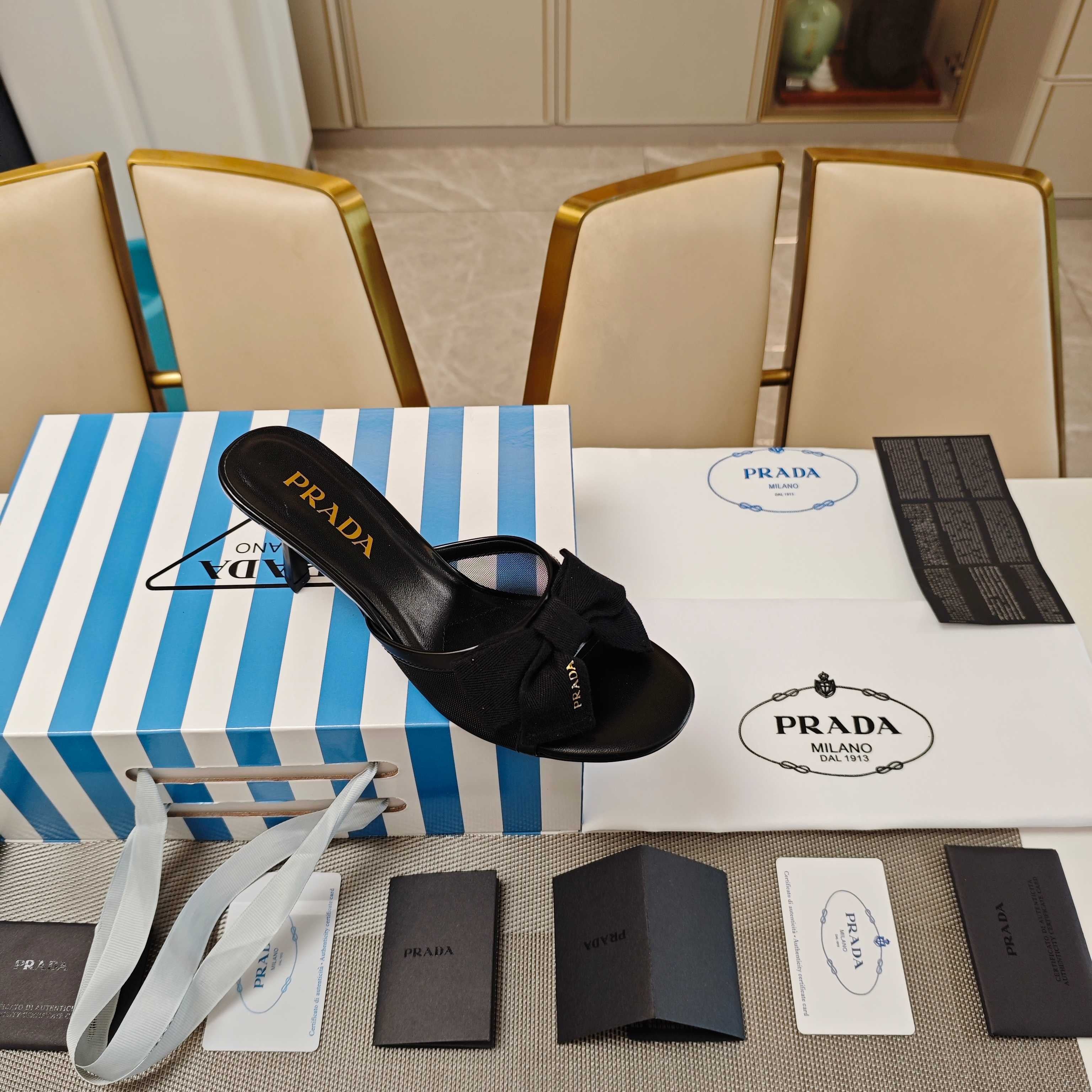 PRADA 26S HEEL MULE SANDALS 75MM IN BLACK CALFSKIN WITH BOW