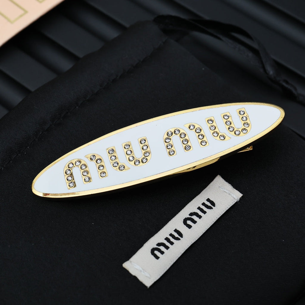 MIUMIU 26S CRYSTAL LOGO HAIR CLIP IN WHITE ENAMEL AND GOLD TONE METAL 626894
