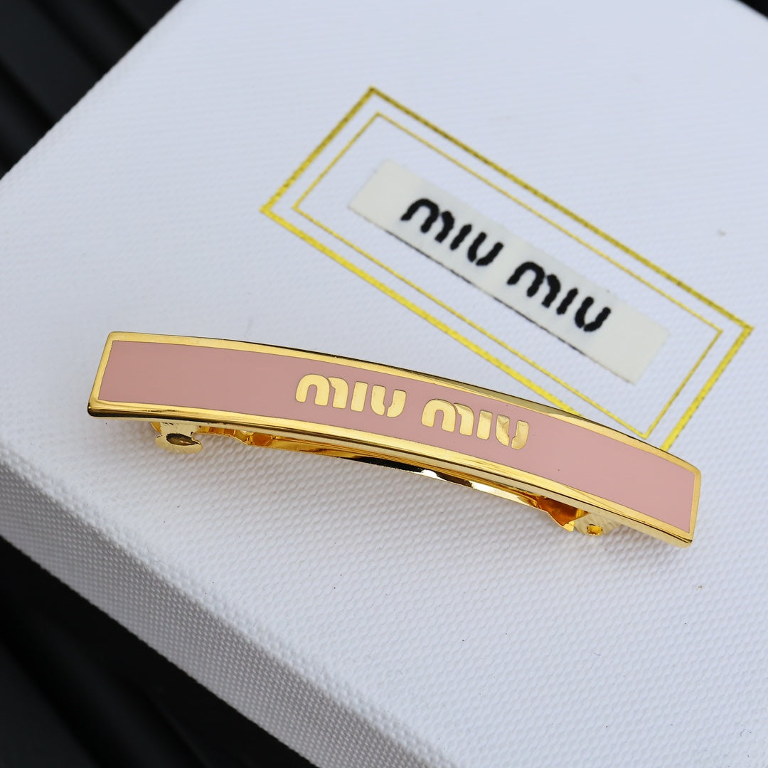 MIUMIU 26S LOGO BAR HAIR CLIP IN PINK ENAMEL AND GOLD TONE METAL 612610