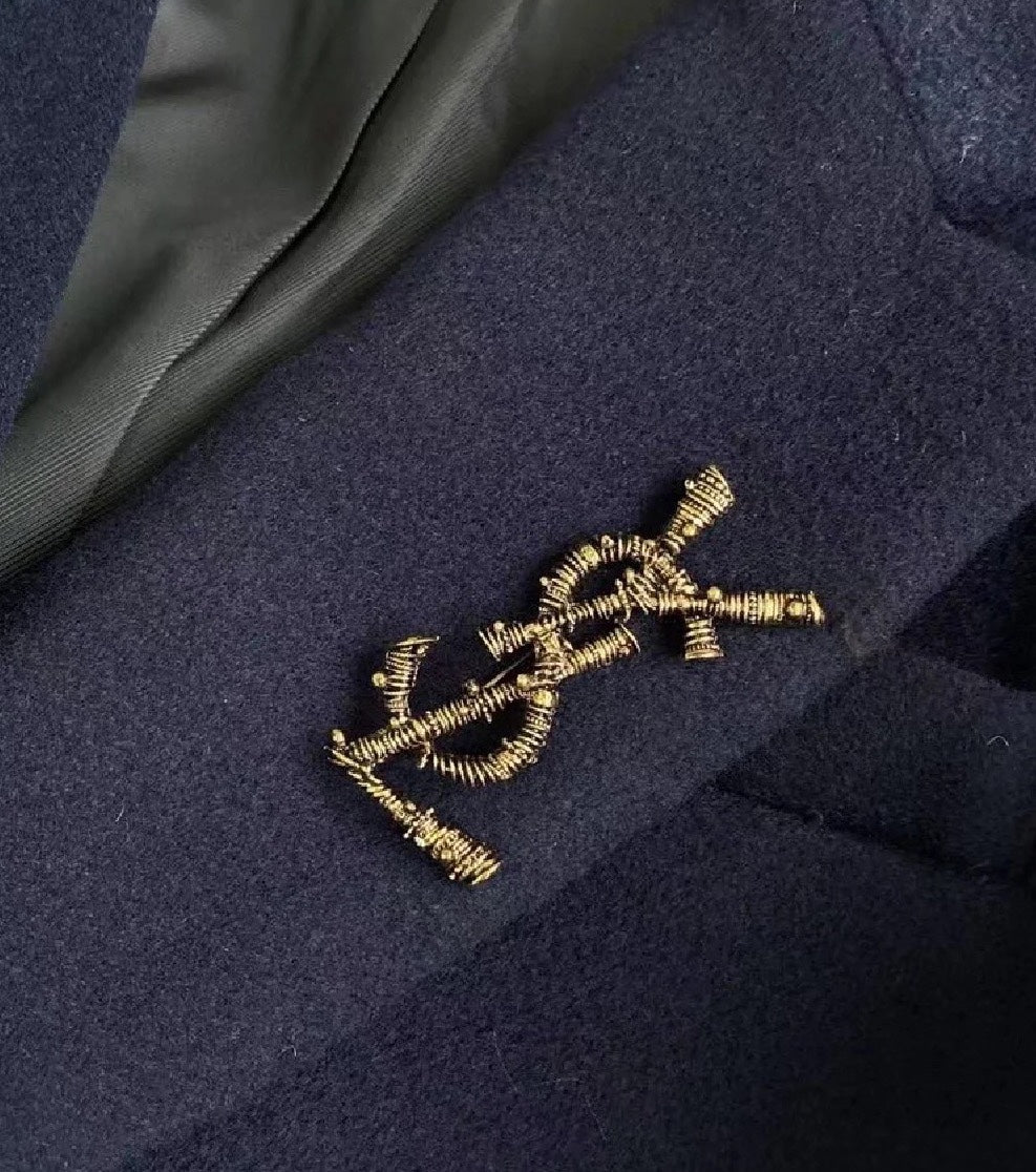 YSL 26S ORNATE TEXTURED MONOGRAM BROOCH IN ANTIQUE GOLD TONE METAL 617587