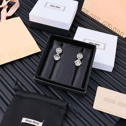 MIUMIU 26S CRYSTAL DROP LOGO STUD EARRINGS IN SILVER TONE METAL 626892