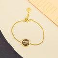 MIUMIU 26S ROUND LOGO CHAIN BRACELET IN GOLD TONE METAL 621549