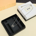 MIUMIU 26S ROUND LOGO PENDANT NECKLACE IN BLACK SILVER TONE METAL 612608