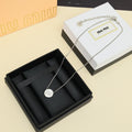 MIUMIU 26S ROUND LOGO ENAMEL PENDANT NECKLACE IN WHITE SILVER TONE METAL 612608