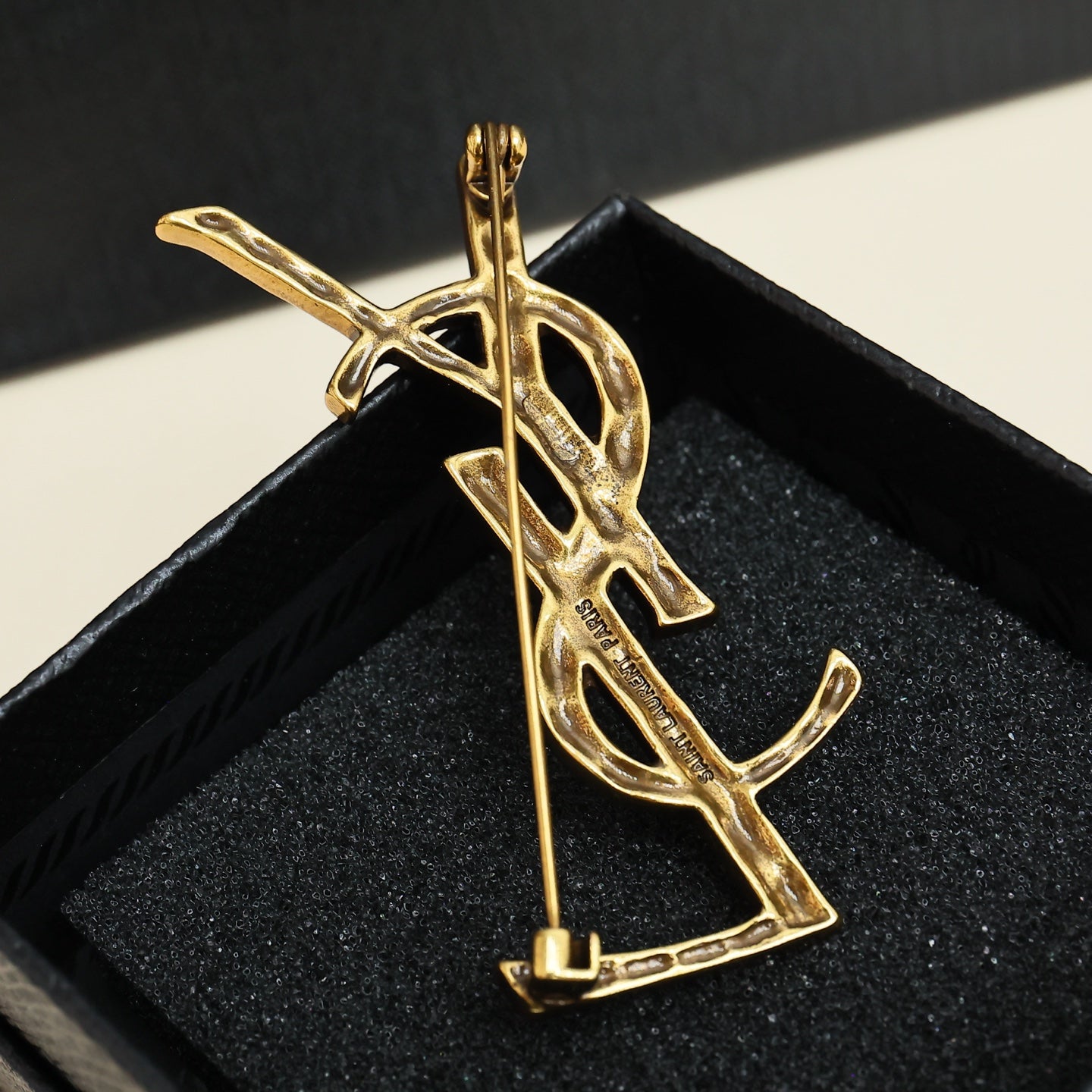 YSL 26S BAMBOO TEXTURED MONOGRAM BROOCH IN GOLD TONE METAL