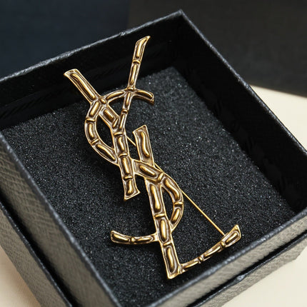 YSL 26S BAMBOO TEXTURED MONOGRAM BROOCH IN GOLD TONE METAL
